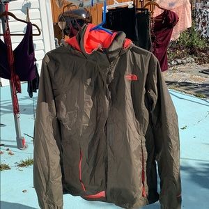 Orange and green Northface jacket